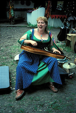 Woman Playing Dulcimer